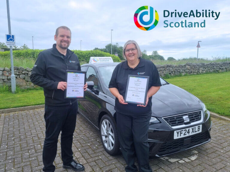 Fiona and Alex with certificates